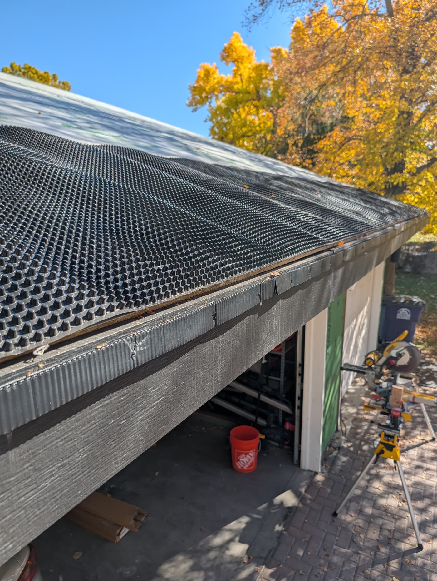 Close-up of ventilated dimple mat at the roof eave before metal panels go on