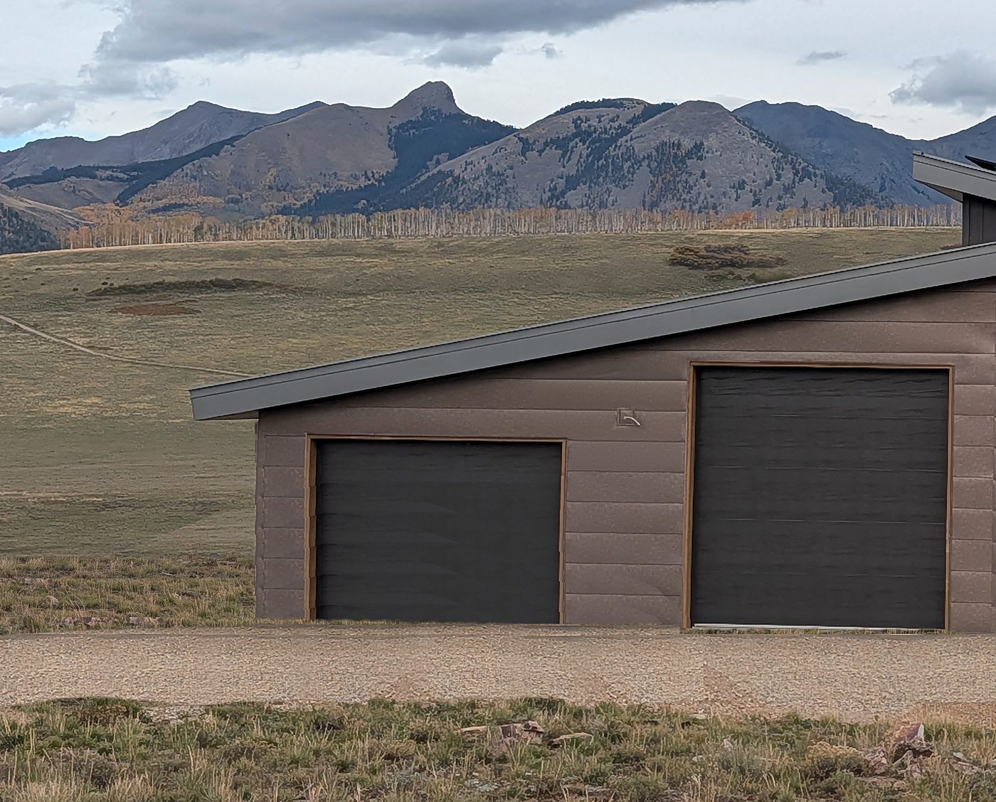 Wilson Mesa Mountain Home, Telluride Garage with Speckled Blackened Copper metal siding on Wilson Mesa near Telluride